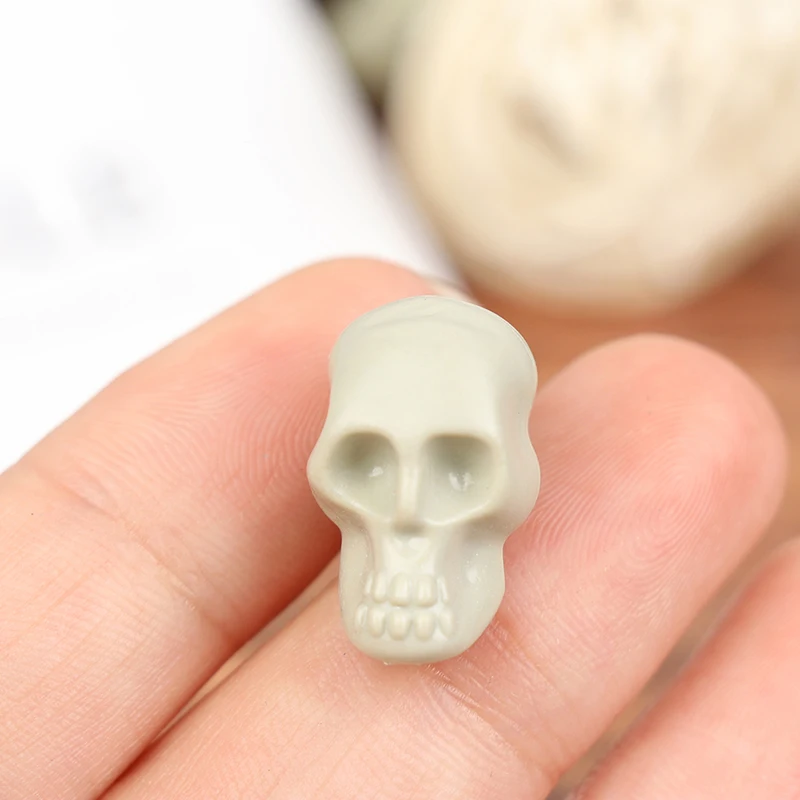 50Pcs การจำลอง Skull ของเล่นโมเดิร์น Mini Skull ตกแต่งบ้านตลกของเล่นคอลเลกชัน Miniatures ชุด2*1.5ซม.