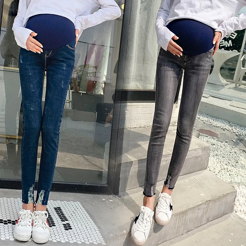 

Pregnant women's pants spring models pregnant women's elastic stomach lift trousers tattered feet slim slimming pencil pants