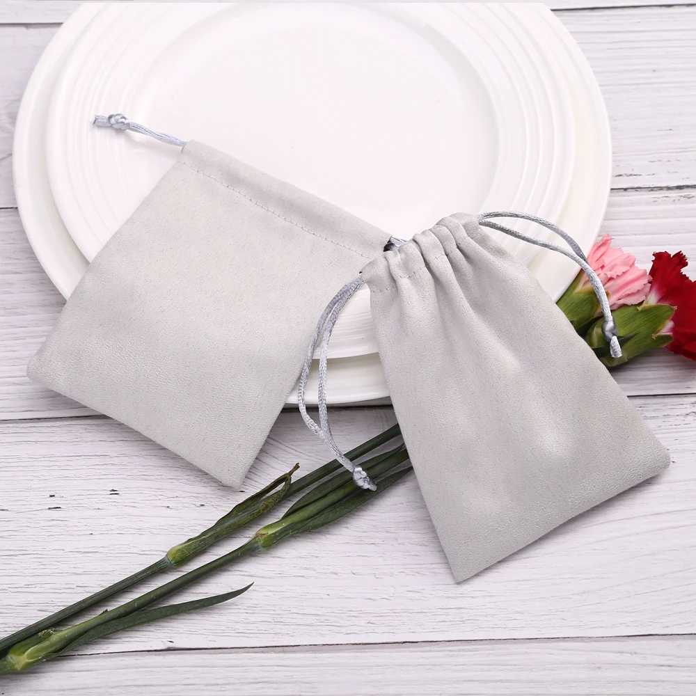 50pcs 7x9cm Light Blue Flannel Drawstring Packing Jewelry Packaging Display Luxury Velvet Suede Pouches Wedding Favors Gift Bags