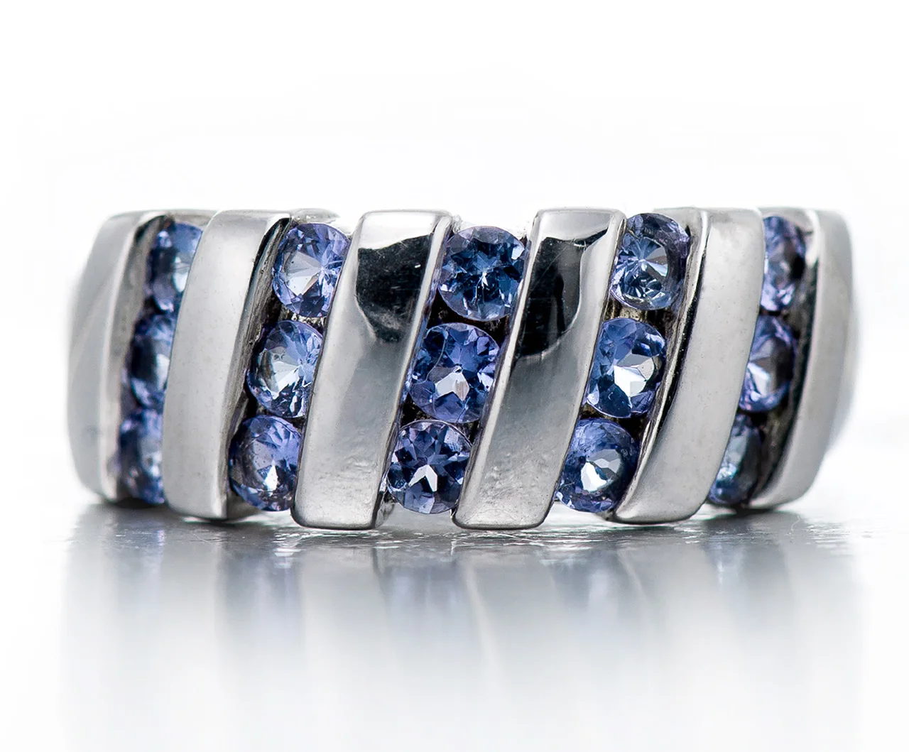 Tanzanite Rhdoium Over Sterling Silver Ring. wholesale trendy engraved wedding bands for couple colorful