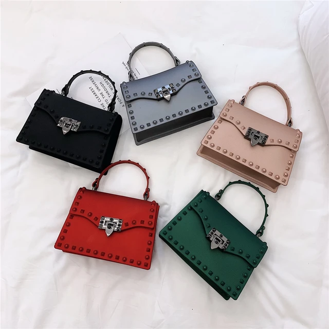 Kobiety małe torebki z pcv wysokiej jakości damskie torby listonoszki projektant mody damskie portmonetki Casual nitowa torba Crossbody