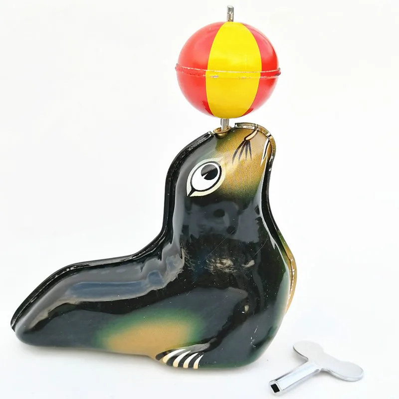 1PCS Tin Sea Lion Top Ball Chain Winding Dolphin Retro Collection Toys Wind Up Toys for Children