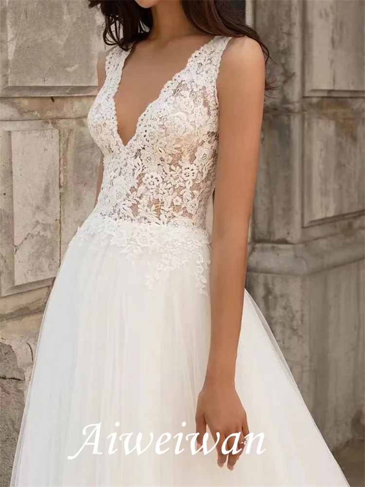 A-Line abiti da sposa scollo a V Sweep / Brush Train pizzo Tulle senza maniche spiaggia con applicazioni 2021