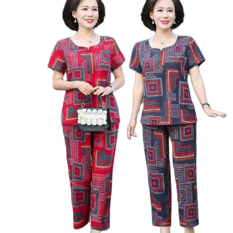 

The New Summer Suit Middle-Aged Elderly Women Printing Short Sleeve Casual Fashion Jacket + Nine Points Pants Loose Female 2PCS