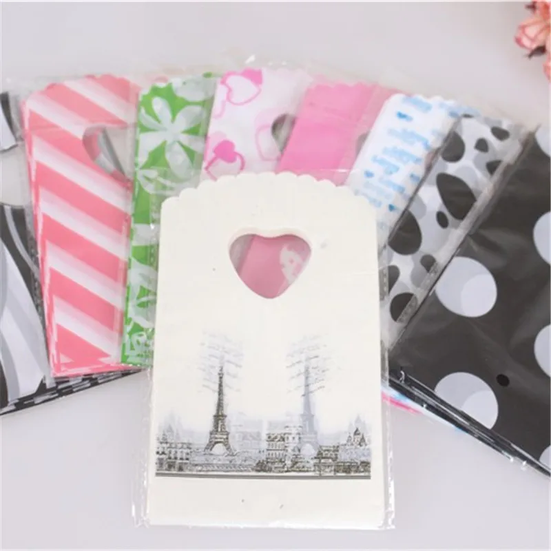Hot Sale New Style Wholesale 50pcs/lot Eiffel Tower Mini Jewelry Plastic Gift Packaging Bags With Handles Small Gift Bags