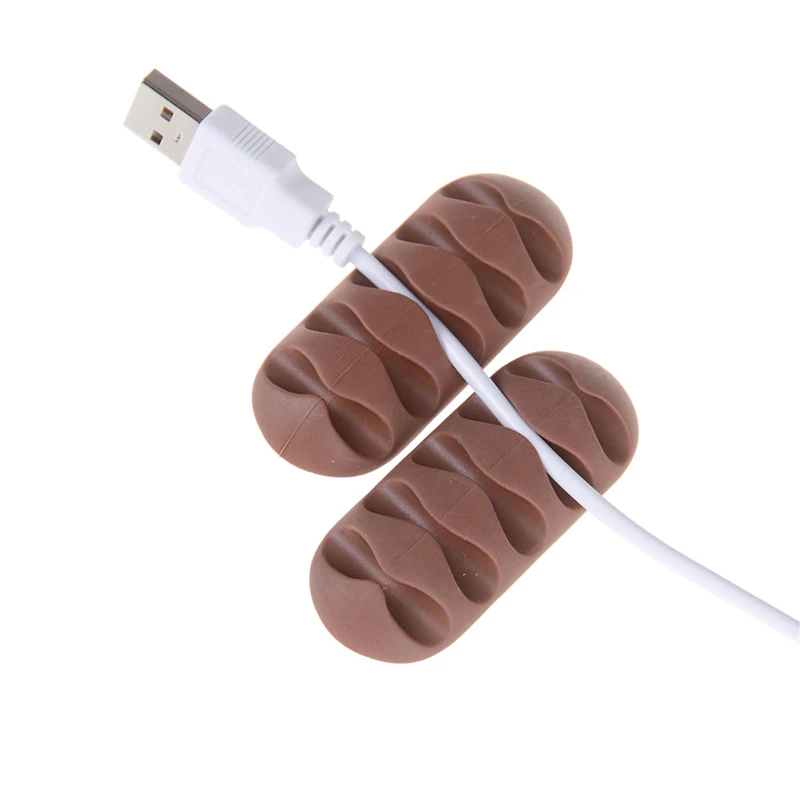 Nuovo prodotto 2 pezzi/set dell'organizzatore di cavi da scrivania cavo in Silicone autoadesivo caricatore USB cavo avvolgicavo cavo dati morsetto