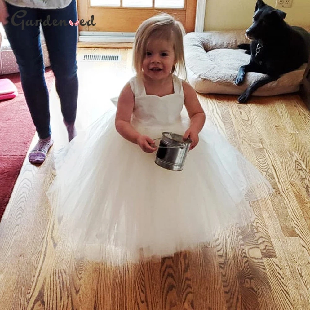 Abiti da ragazza di fiore gonfio abito da principessa in Tulle cinturino per Spaghetti abito da prima comunione per bambini abito da festa di compleanno per ragazza a rete con fiocco