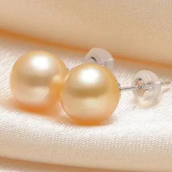 A pair of 10-11mm south sea round gold pink pearl earrings 18/k