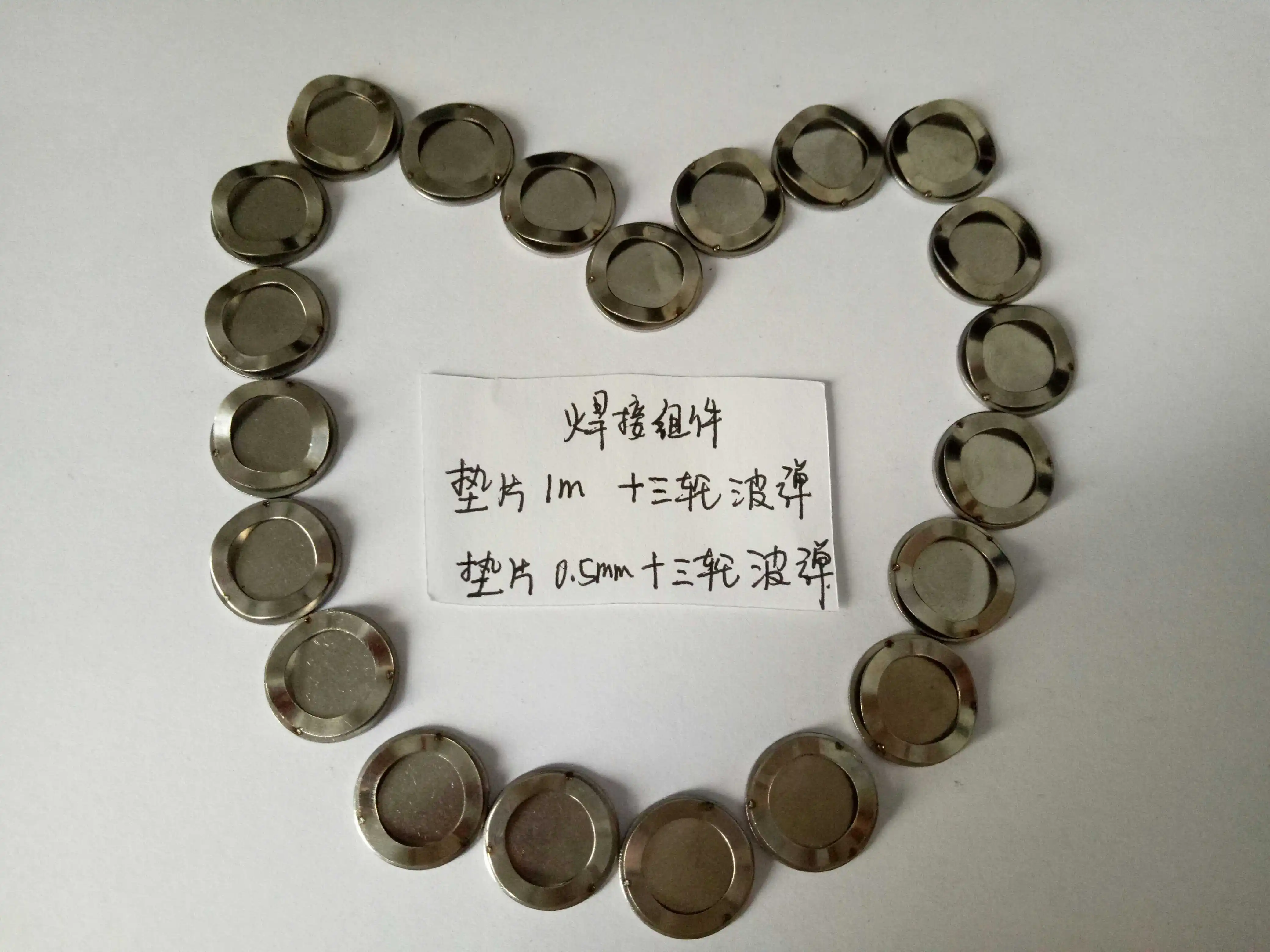 Button Battery Gasket + Shrapnel Welding Assembly