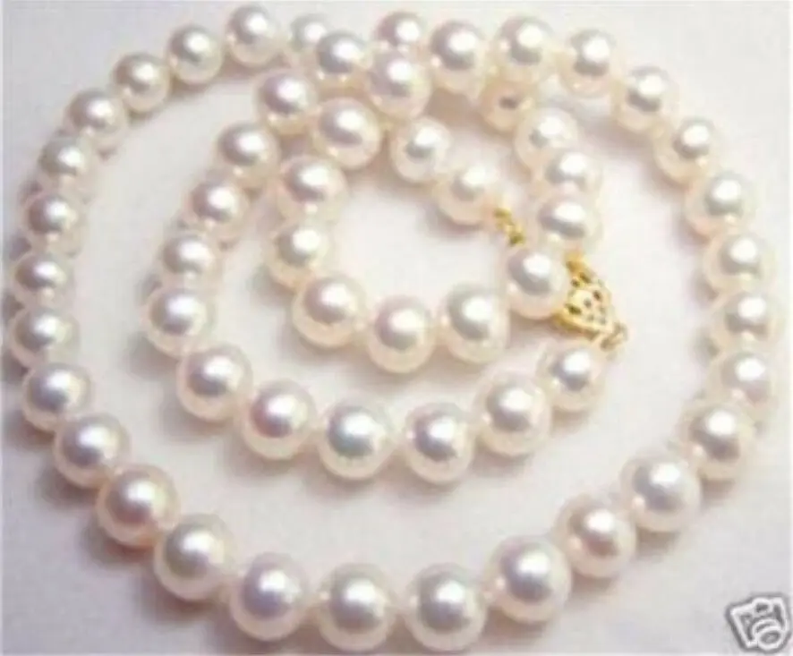 

9-10MM NATURAL WHITE SOUTH SEA AAA+ PEARL NECKLACE 32"