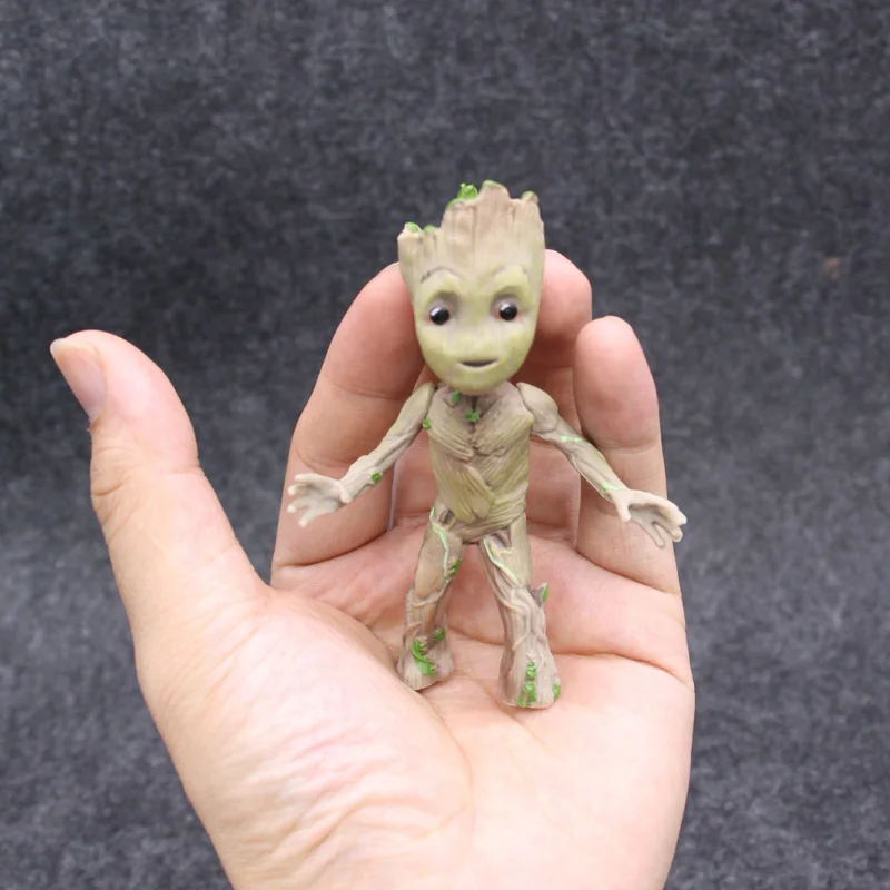Groot Tiny Cute Baby Tree Man Stand Ver Figuras de acción Juguetes 10cm