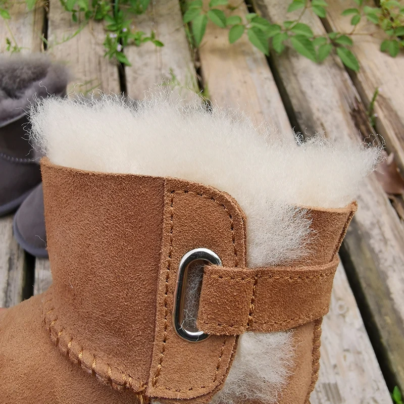 Zapatos de piel de oveja para bebé, botas para niño y niña, diseño de lujo para evitar resbalones, de lana cálida