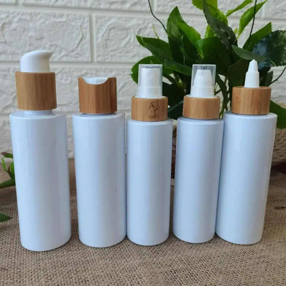 Eco friendly cosmetic containers frosted /white/clear plastic bottles and cream jars bamboo cap spray lotion pump bottle 8oz 5oz