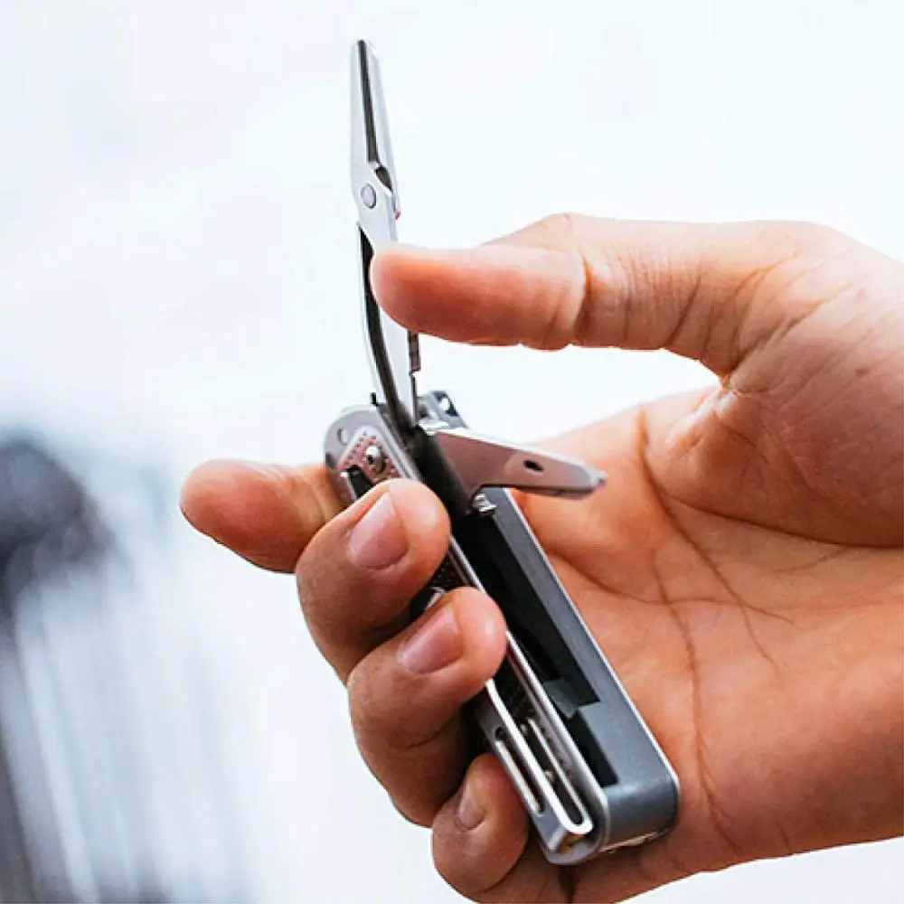 LEATHERMAN - FREE T2/T4 Multitool and EDC Pocket Knife with Magnetic Locking and One Hand Accessible Tools