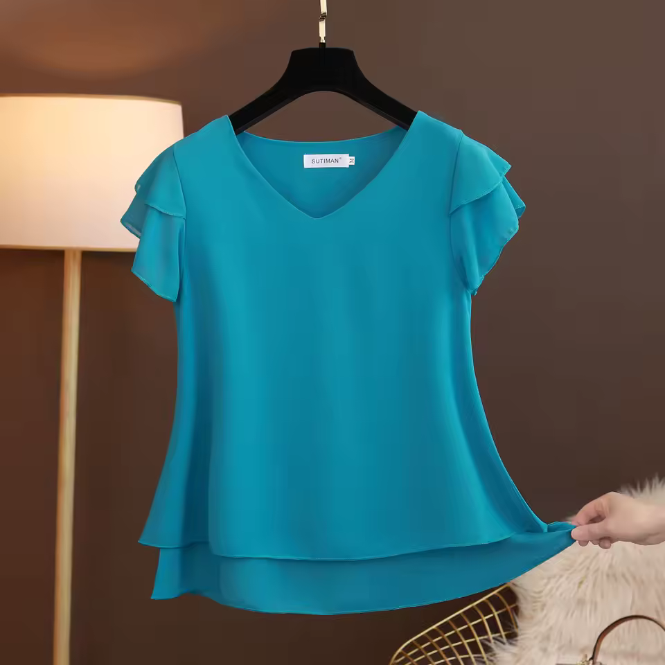 Ruffle sleeve detail on chiffon blouse