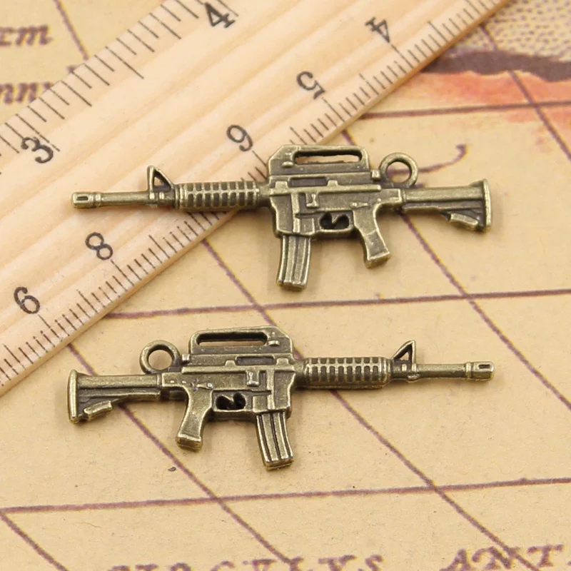 10pcs Charms Machine Gun Assault Rifle 45x16mm Tibetan Bronze Silver Color Pendants Antique Jewelry Making DIY Craft