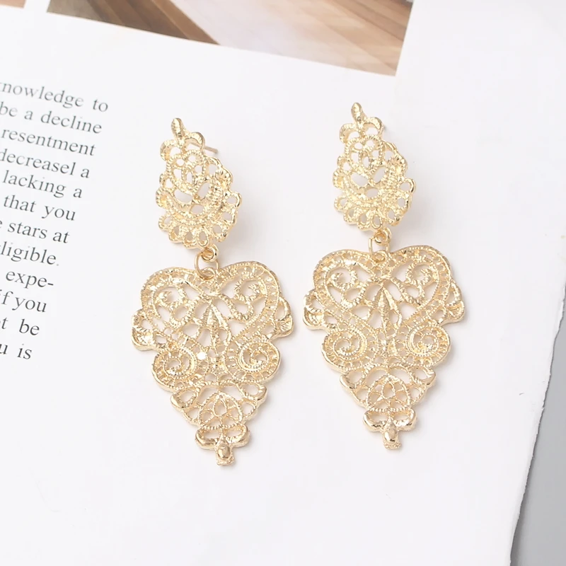 Retro Hollow Bohemian Fashion Leaf Pendant Earrings for Women Simple Alloy Flower Brincos Long Jewelry Accessories Girl Gift