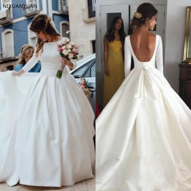 

2023 Backless Wedding Dresses Bll Gown Vintage Scoop Long Sleeves Satin Bridal Gown Open Back Simple Design Bride Reception Wear