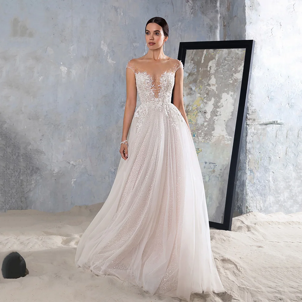 

Sexy Sheer Neck A Line Wedding Dresses Cap Sleeves See Through Glitter Bridal Gown Appliques Tulle Bride Dress Plus Size