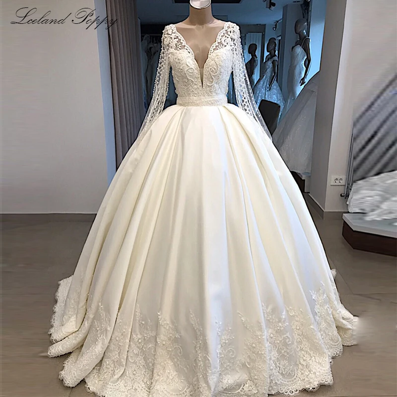 Luxury A-line V-Neck Satin Wedding Dresses Pearls Beaded Long Sleeves Floor Length Illusion Back Vestido de Novia Bridal Gowns