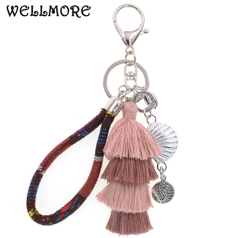 WELLMORE bohemia breloczki handmade shell z długim pomponem alloy breloczek damska torba brelok biżuteria dropshipping