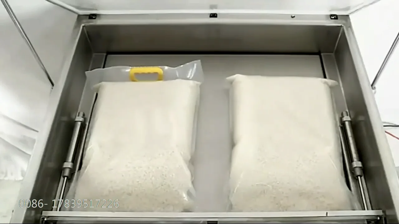 Única câmara automática arroz tijolo saco de plástico aferidor máquina selagem/máquina embalagem a vácuo