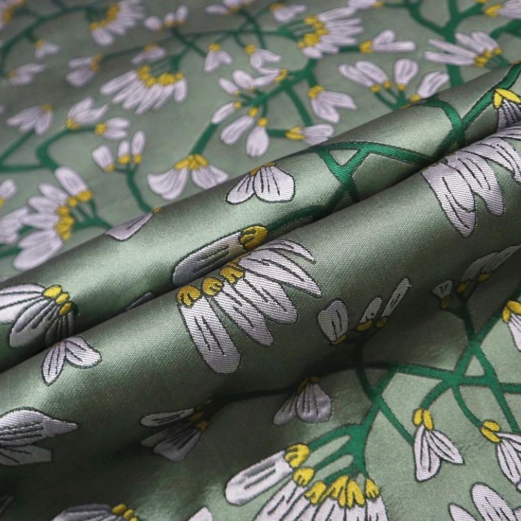 Elegant daffodil three-dimensional yarn-dyed jacquard fashion fabric, sewing fabric factory shop is not out of stock