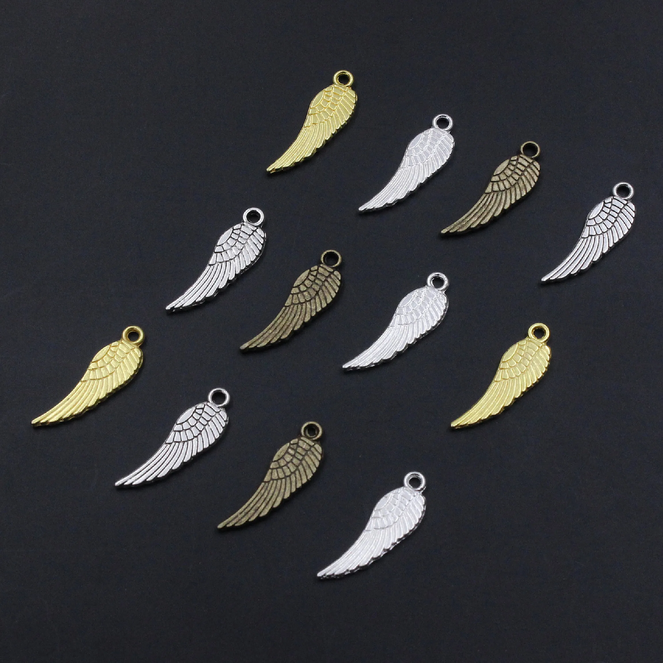 Onebeading 100pcs Tibetan Silver Wings Pendant Charms Beads 5x16.5mm (K00108)