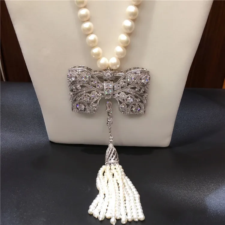 Hot sell new style 8-9mm white freshwater pearl necklace bowknot zircon accessories long tassel sweater chain fashion jewelry