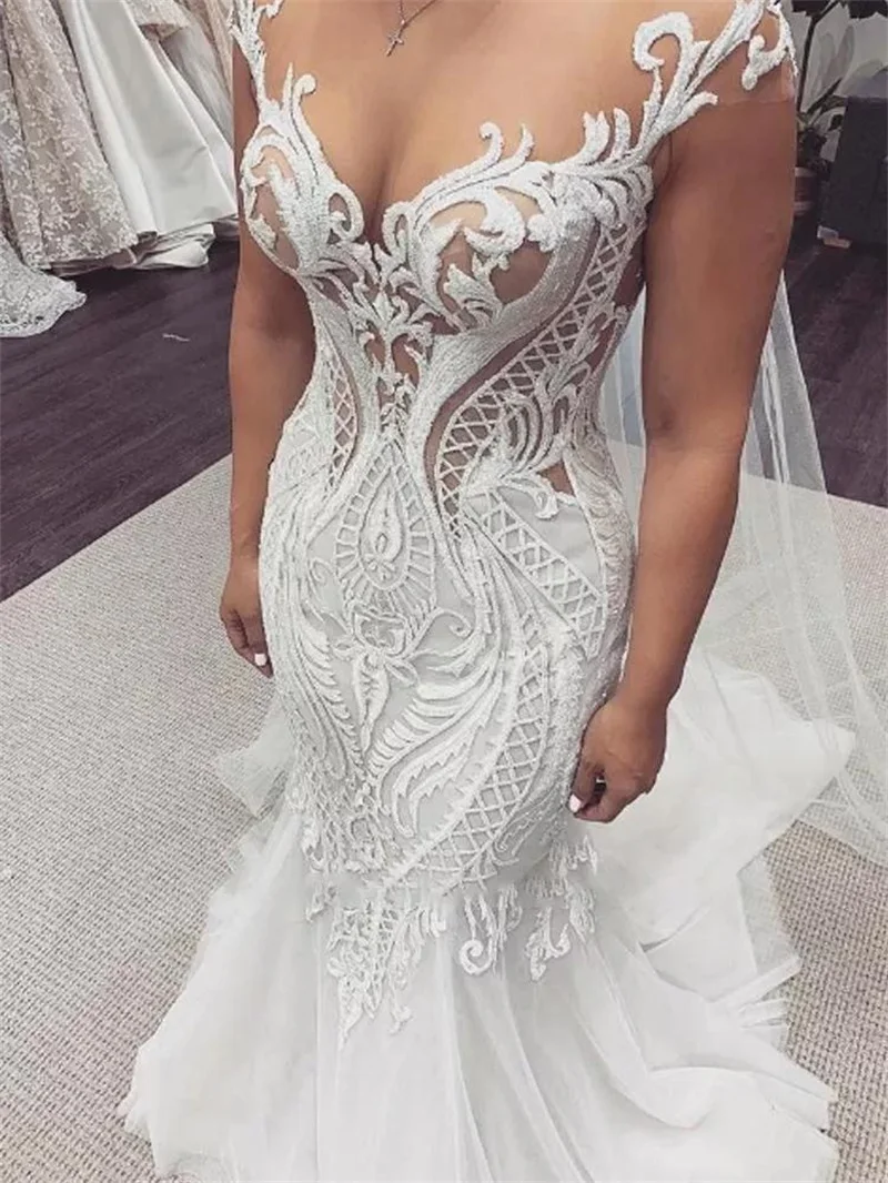 Plus Size Mermaid Wedding Dresses Bridal Gowns Sleeveless Sheer Jewel Neck Lace Appliqued Button Back Arabic Custom Made Robe