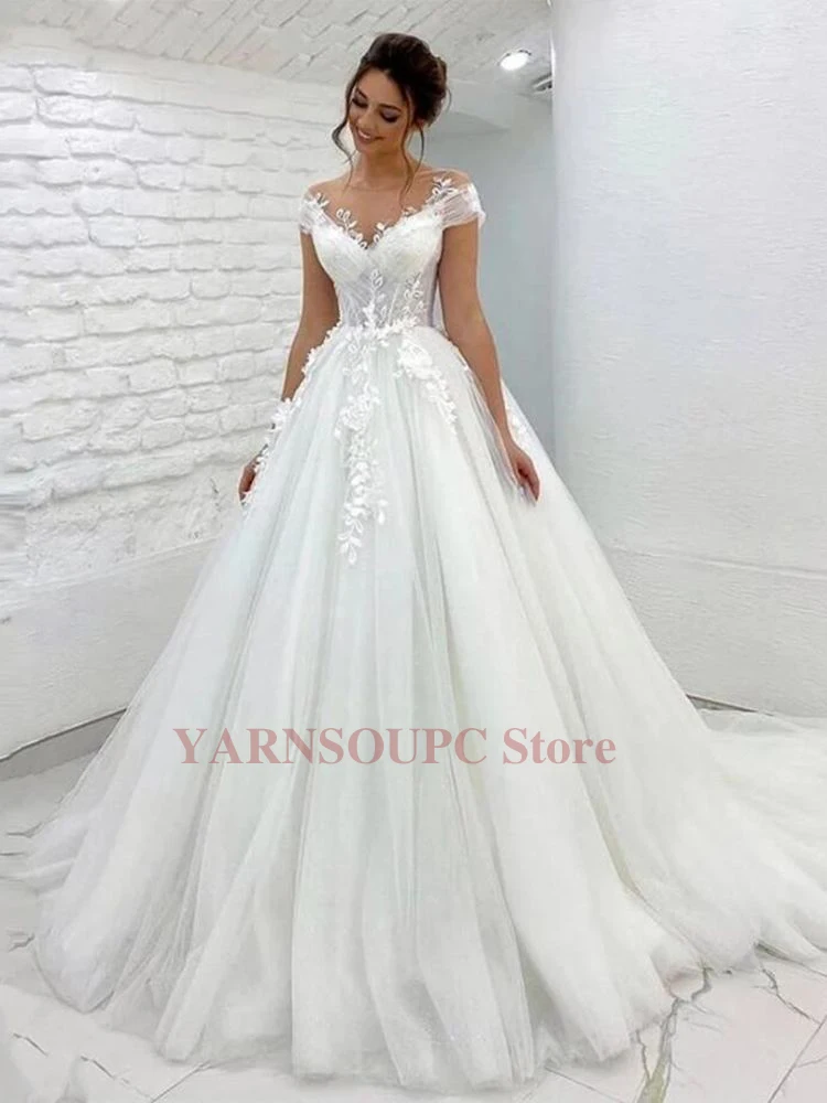 

Vestidos de novia de princesa de tul elegantes, cuello transparente, mangas casquillo, apliques de encaje, vestido de novia con