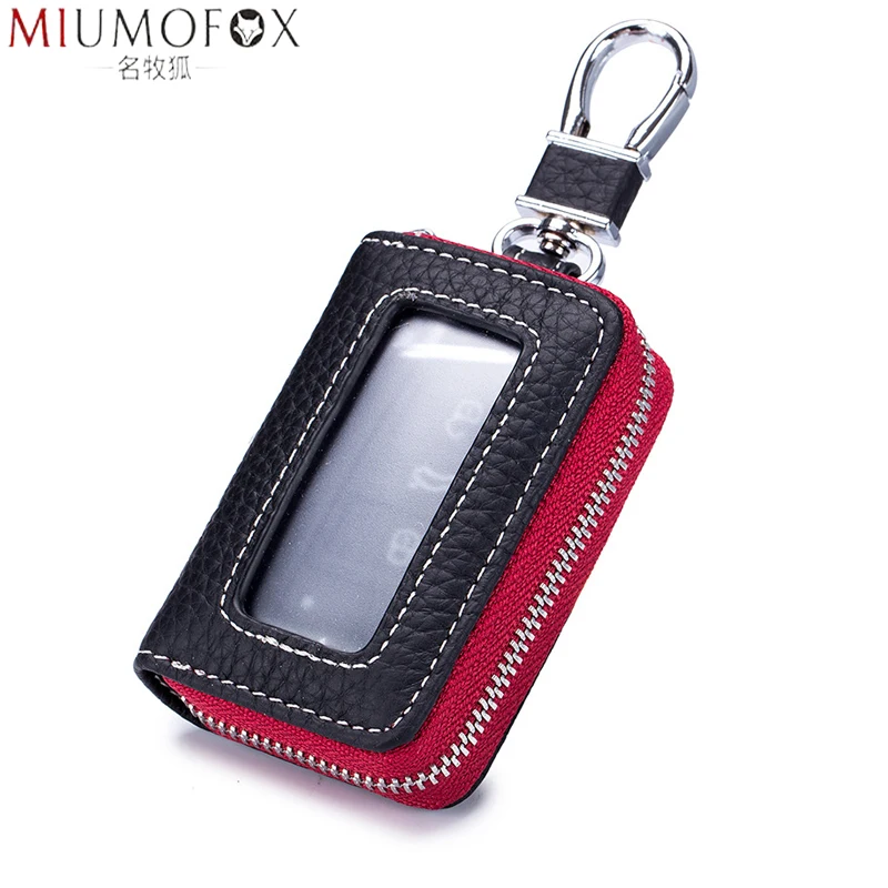 Funda de cuero genuino con cremallera para llaves de coche para hombre y mujer, billetera para colgar en la cintura, soporte para llaves de vehículos de Motor, a la moda, ama de llaves