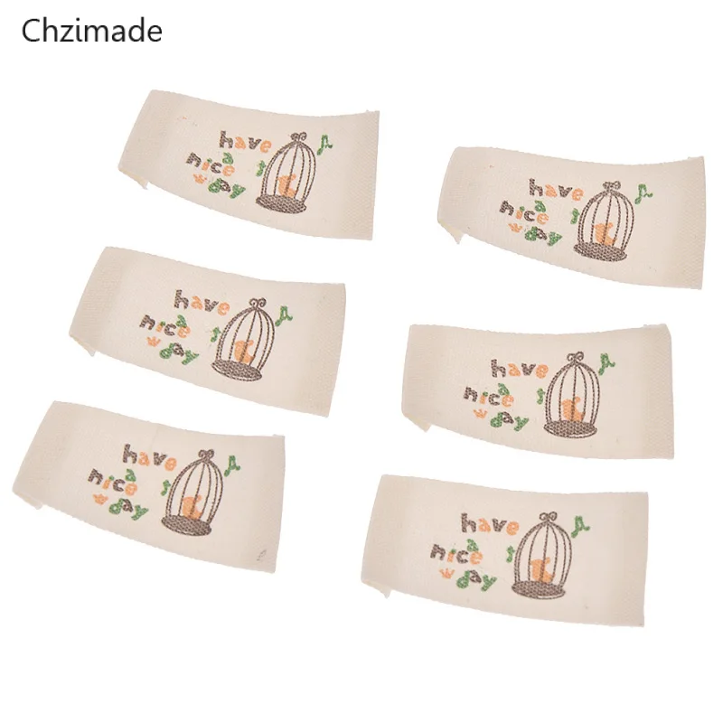 Lychee Life 50Pcs/lot Washable Cloth Woven Labels Cartoon Music Birdcage Sewing Tag Labels For DIY Colthes Materials