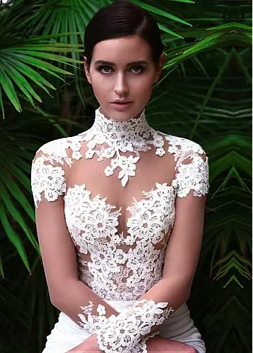 Abiti da sposa Vintage a sirena con collo alto 2024 con Appliques manica lunga Illusion Sexy vedere attraverso abiti da sposa corpetto