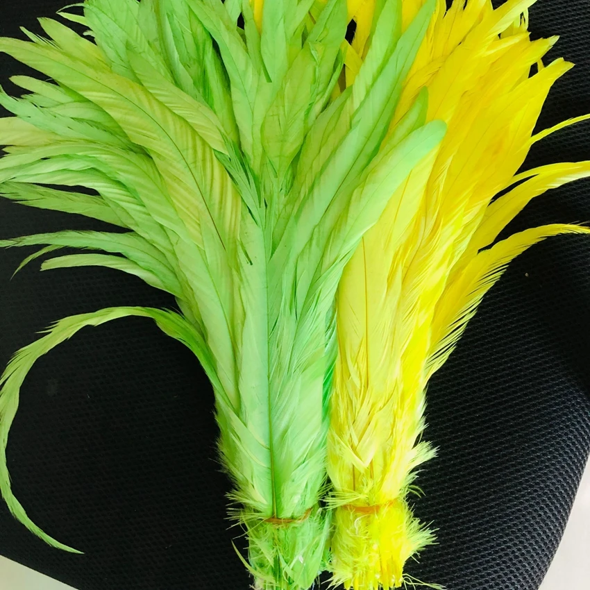 Moda 100 pz 25-30cm 10-12 pollici piume di coda di gallo fluorescente per la decorazione artigianato piuma matrimonio Cafts fai da te accessori