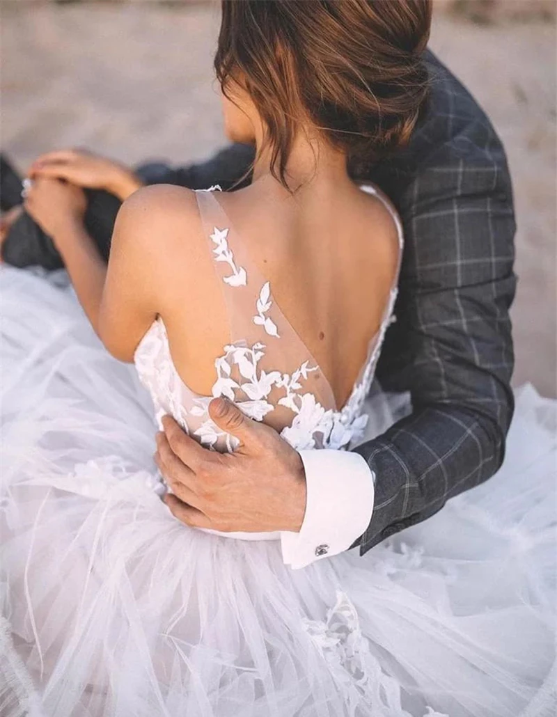 Abiti da sposa romantici della boemia abiti da sposa senza maniche in pizzo con scollo a v e fiori