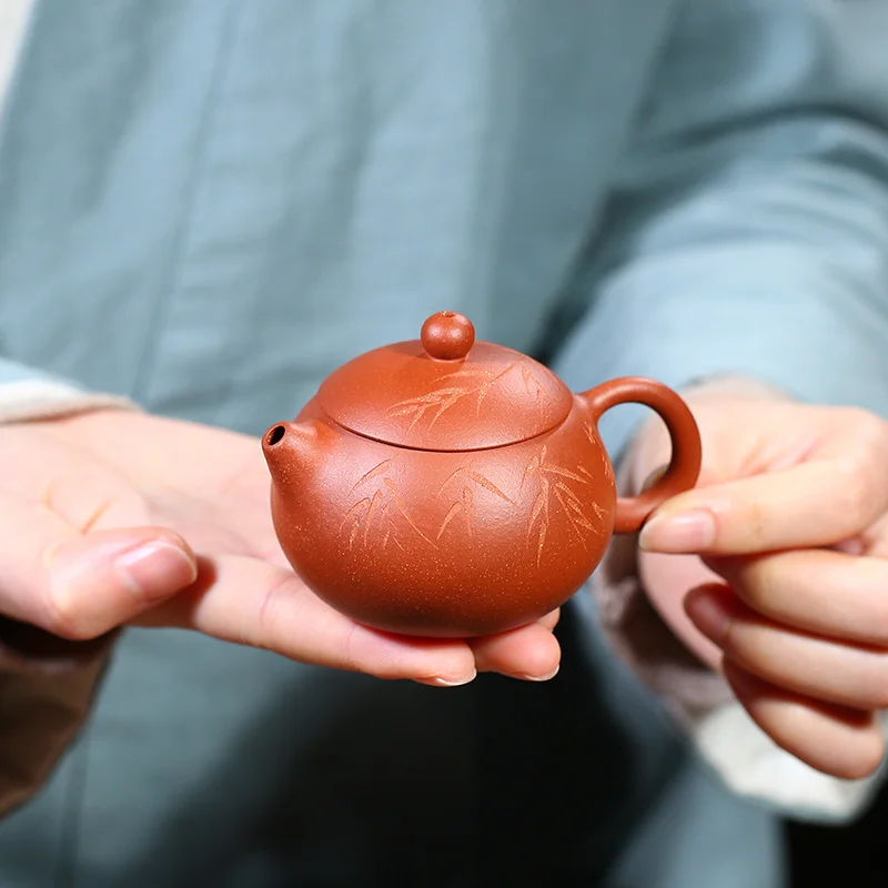 

|purple clay pot with sloping mud ball hole and small capacity Xishi pot household Kung Fu tea pot with special price