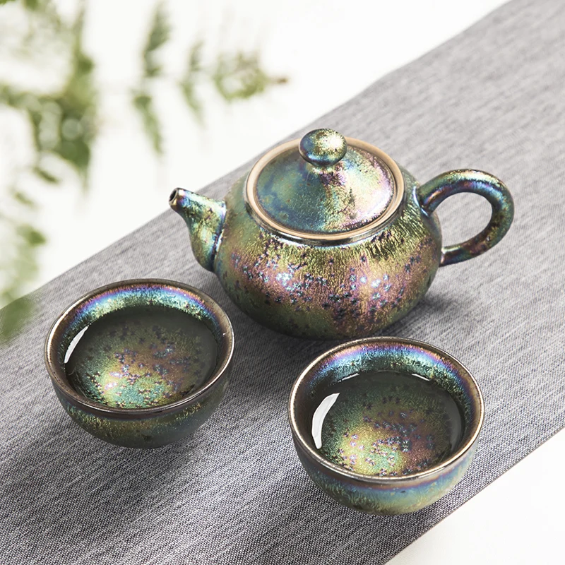 

Jianzhan creative tea pot kiln change pottery pot with matching tea cup Chinese kungfu tea set Tianmu glaze on sales in China