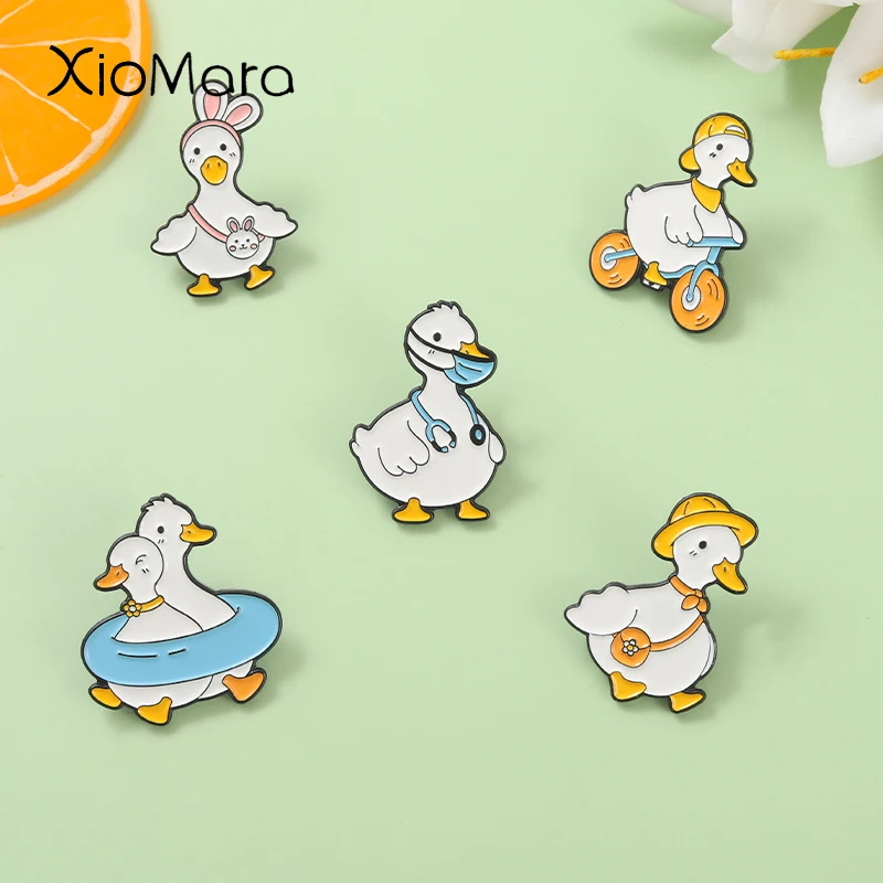 

Cute Funny Duck Enamel Pins Cool Duckling Ride Bicycle Metal Brooches Backpack Decorative Lapel Badge Gift for Friends Wholesale