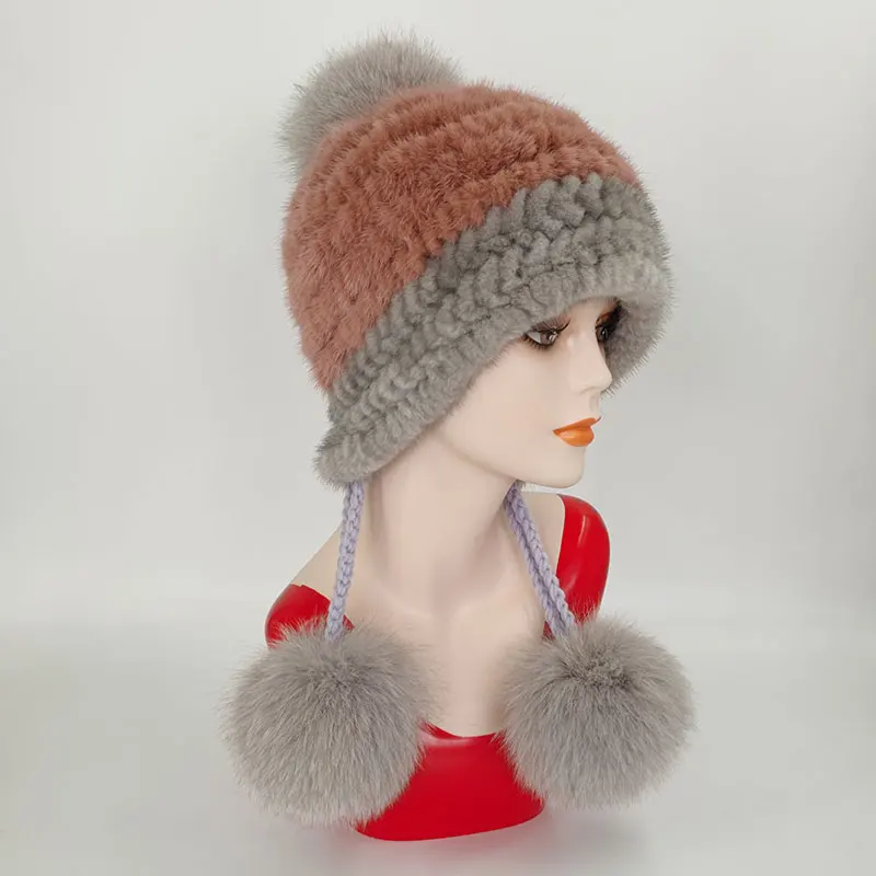 

Женская шапка-Авиатор из меха норки с шариком из лисьего меха
