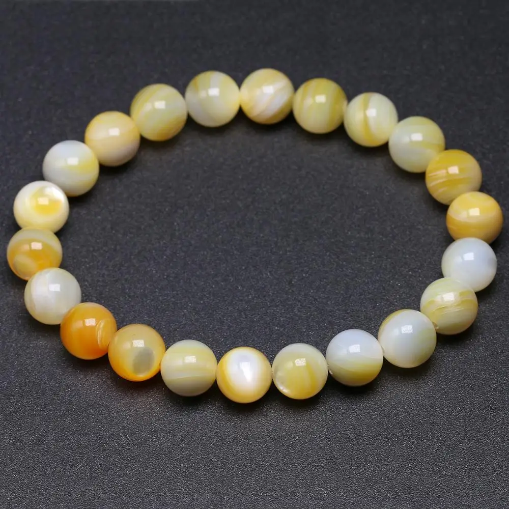 

Natural Yellow Shell Round Beads Elastic Line Stretch Bracelet Women Handmade Jewellery Wholesale