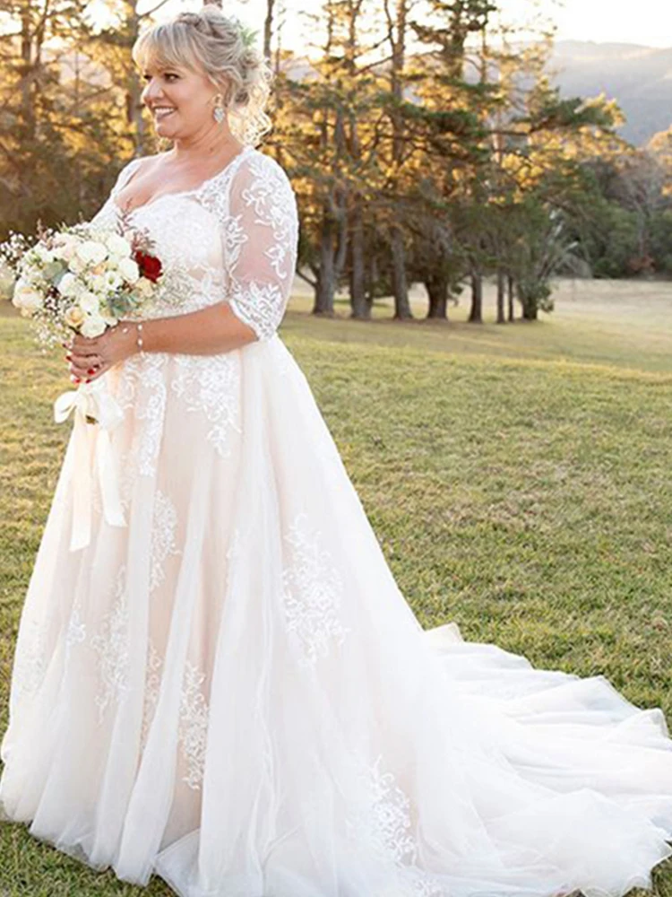 Robe de mariée élégante en dentelle bohème, grande taille, demi-manches, encolure dégagée, ligne A, jardin Boho