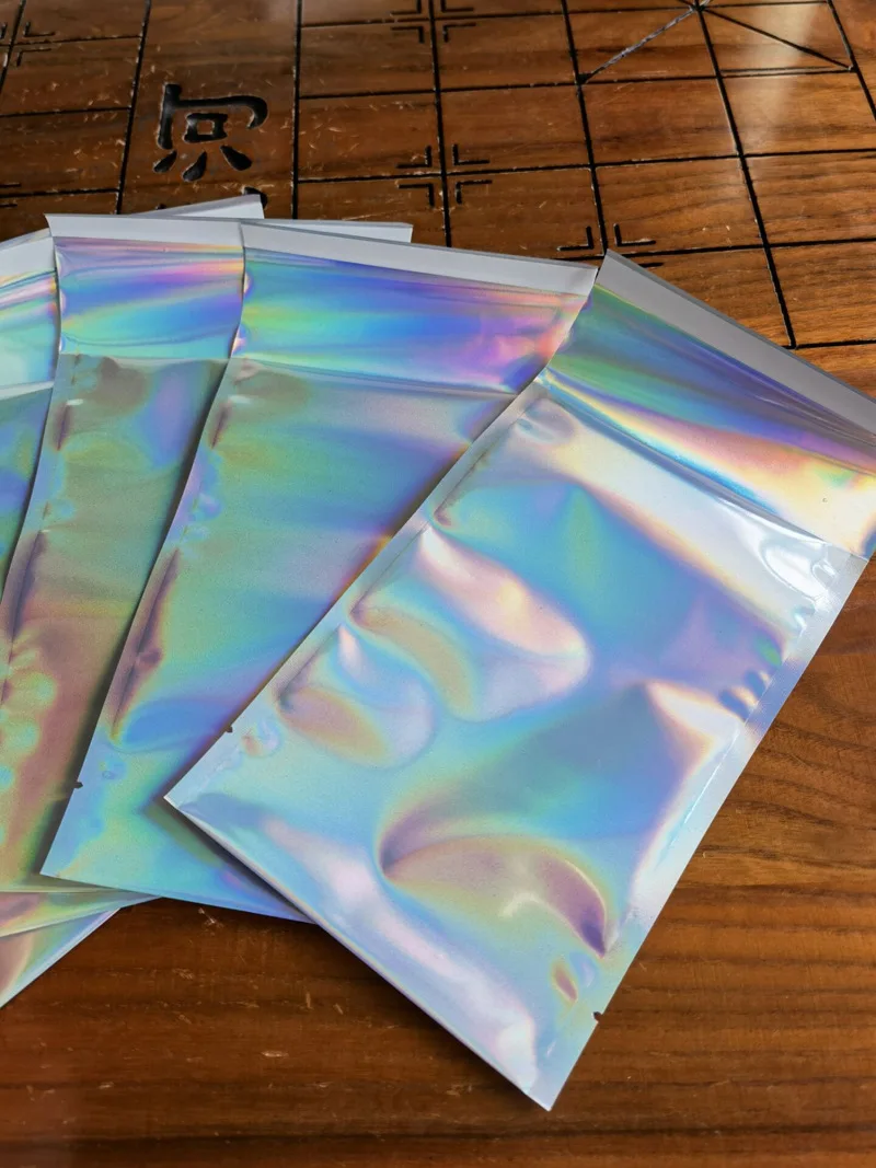50Pcs/lots Plastic Product Packaging Bag Colorful Laser Storage Bags Self Sealing Jewelry Cosmetics Envelope Courier Mailing Bag