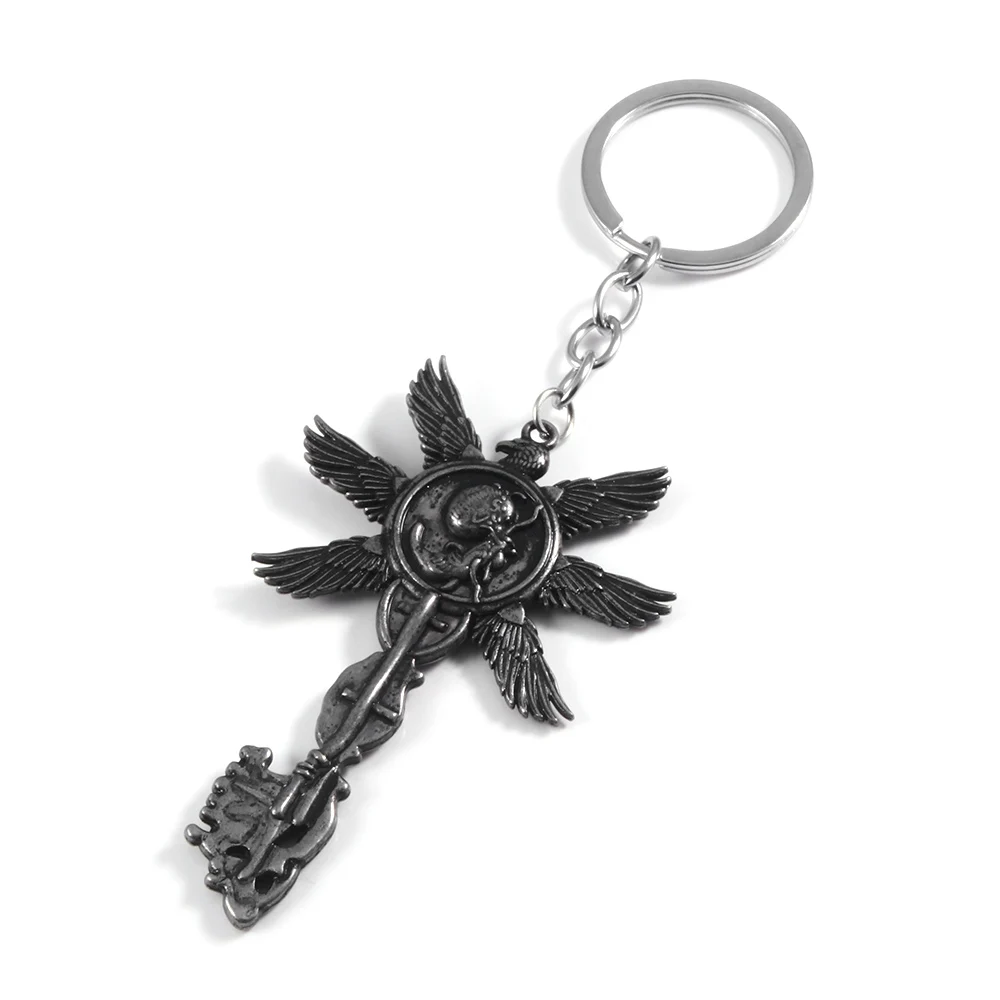 Vintage Six-Winged Unborn Key Pendant Keychain