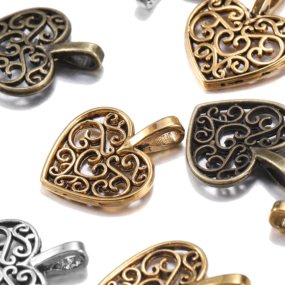 30Pcs/Lot Vintage Tibetan Metal Bronze Plated Hollow Out Heart Antique Pendants Charms Bracelet for DIY Jewelry Making Supplies