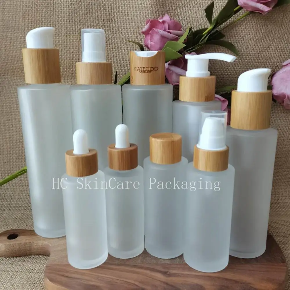 Wholesale Frosted Clear Glass Cosmetic Toner Bottles Jar With Natural Bamboo Chiaki Lid Spray Bottle Empty Skin Care Packaging