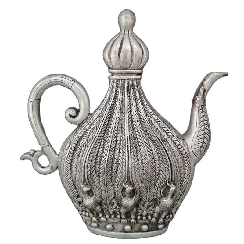 

Chinese Old Tibet Silver Carving Peacock Shaped Wine Pot