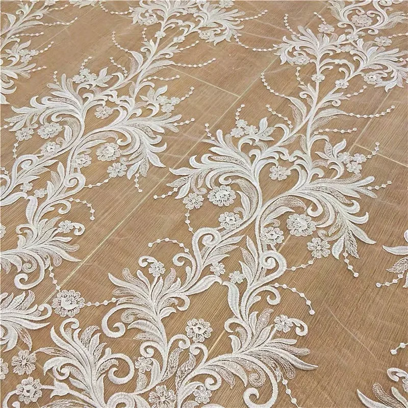 2020 New arrival seuqins lace fabric fashion wedding dress lace fabric 130cm width ivory lace sell by yard