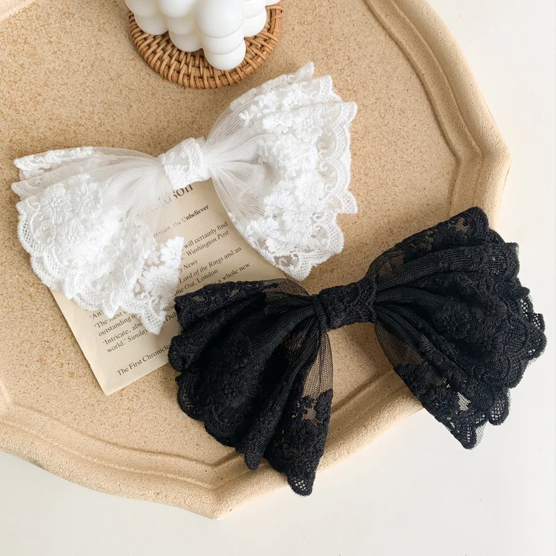 Nowa moda motyl słodka elegancka koronka elastyczne opaski do włosów wiosna spinka do włosów Barrettes dla kobiet dziewczynki akcesoria do włosów nakrycia głowy
