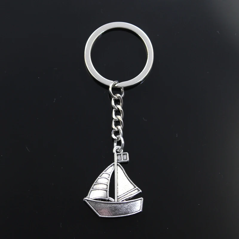 

Fashion Keychain 30x25mm Ship Boat Sailboat Bronze Silver Color Pendants DIY Men Jewelry Car Key Chain Ring Holder Souvenir Gift